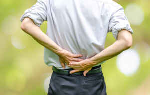 Man suffering with back pain