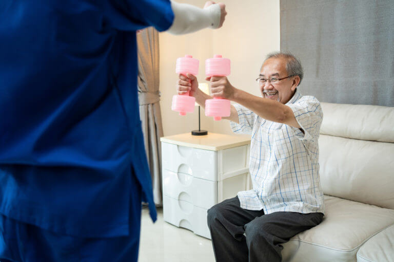 Senior man taking physical therapy session