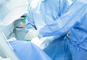 Hospital emergency orthopedics and traumatology surgery operating room medical clinic real life photo in foot, ankle and leg arthroscopy orthopedic operation.