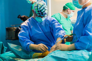 Medical team operating Orthopedic surgery In OT