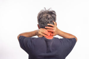 Senior man neck pain because of degenerative arthritis in the neck.