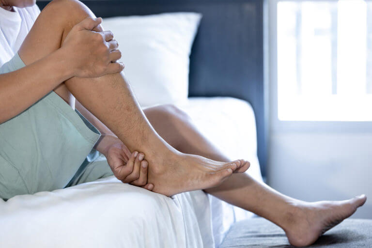 A man suffering from Achilles tendonitis.